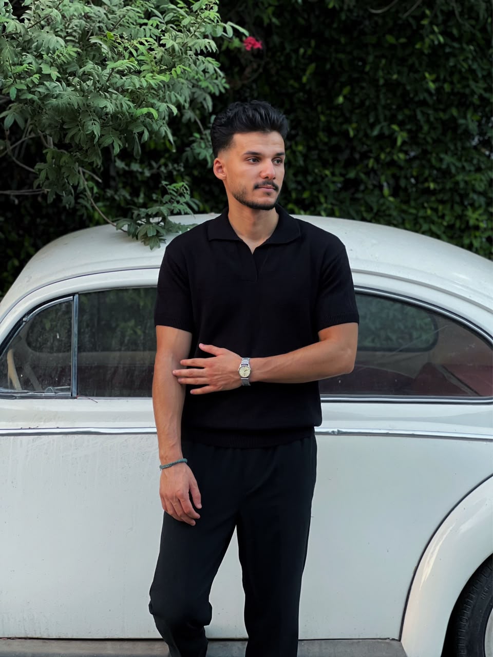 BLACK KNITTED POLO